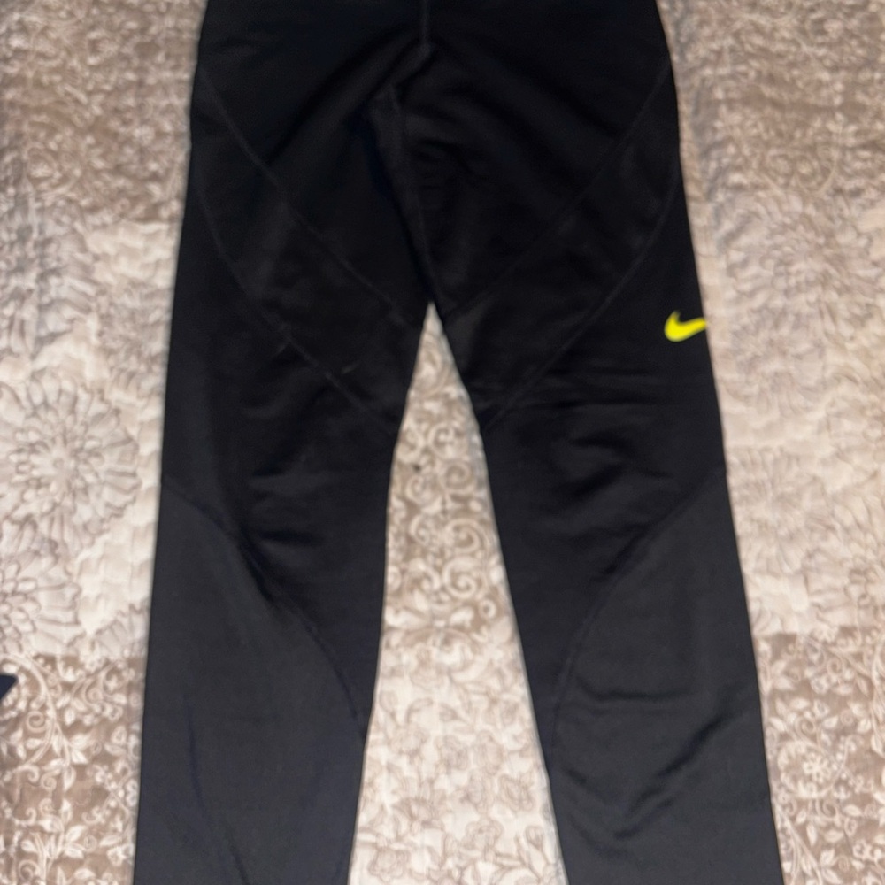 Nike women’s Black Leggings with Yellow Swoosh